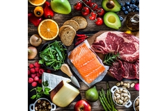 Image Assorted fresh foods including salmon, beef, cheese, fruits, vegetables, bread, and nuts